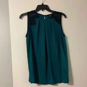 Teal sleeveless blouse
